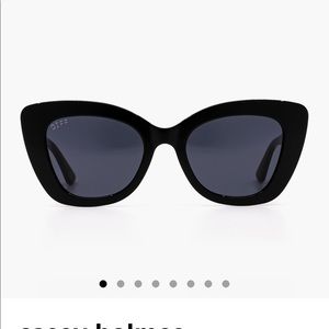 Casey Holmes black sunglasses